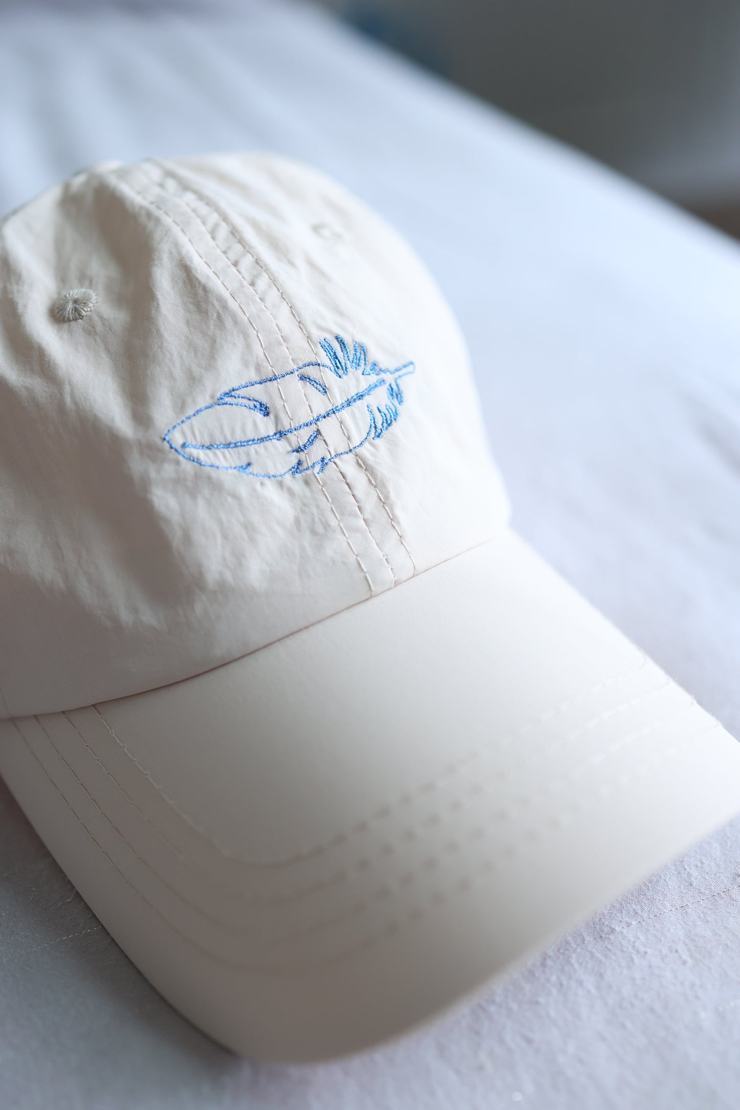 The Witness Beige Weightless Windbreaker Cap