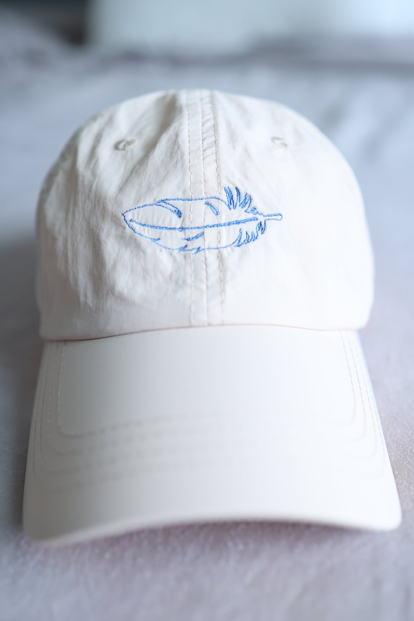 The Witness Beige Weightless Windbreaker Cap